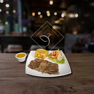 Lomo al ajillo con salsa aparte